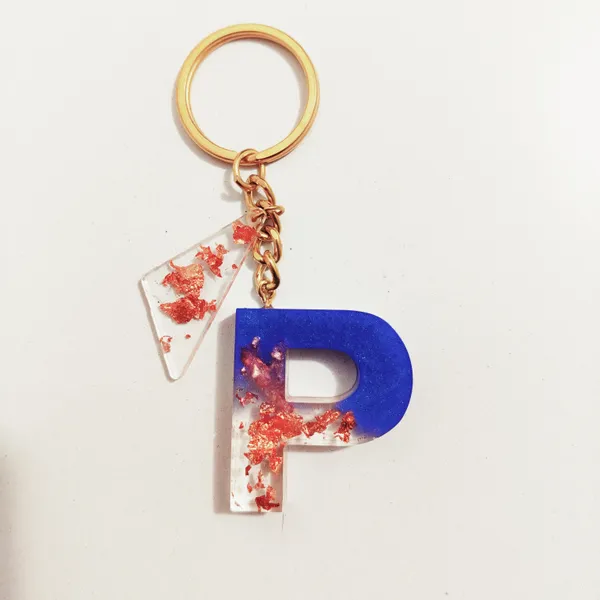 Resin_Alphabate_'Z'_Keychain
(Blue_And_Gold_Flake+Golden_Ring)