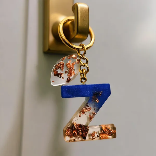 Resin_Alphabate_'Z'_Keychain
(Blue_And_Gold_Flake+Golden_Ring)