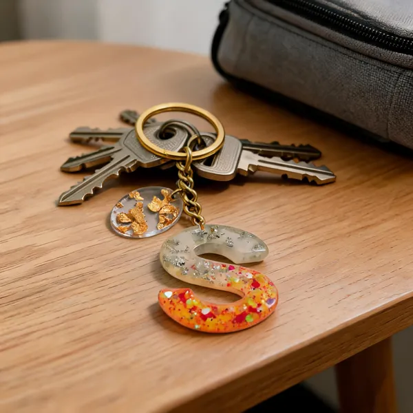 Resin_Alphabate_'S'_Keychain
(Orange_Glitter+Golden_Ring)