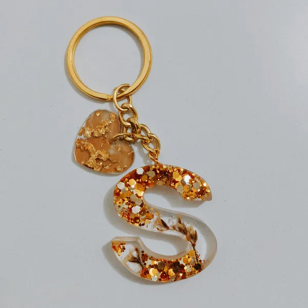 Resin_Alphabate_'S'_Keychain
(Golden_Glitter+Golden_Ring)