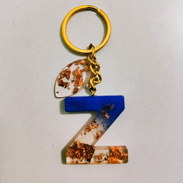 Resin_Alphabate_'Z'_Keychain
(Blue_And_Gold_Flake+Golden_Ring)