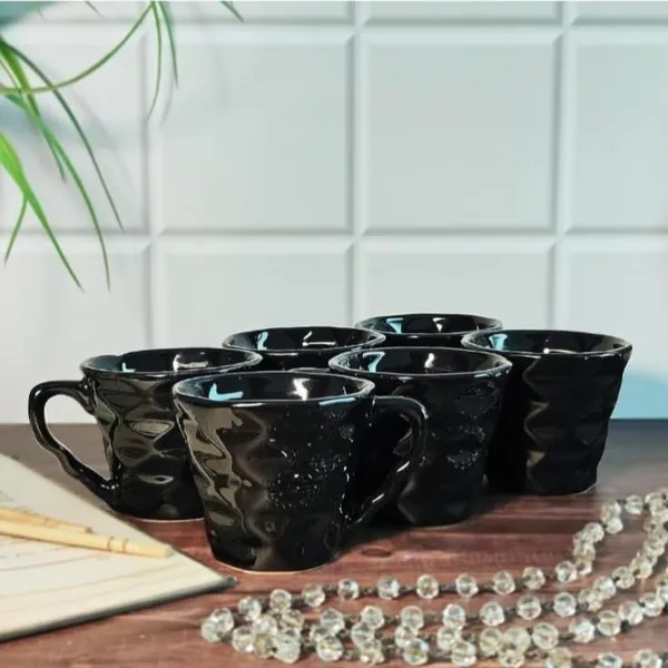 Tea_Cup_Human_Actually_Let_Me_Reconsider_The_Input_Has_Aav_Model_Which_Might_Be_A_Brand_Or_Style_Indicator_But_Black_Is_Likely_The_Color_Following_The_Rules_Strictly_To_Remove_Color_But_Keep_Material_If_Relevant_And_This_Appears_To_Be_A_Tea_Cup_With_No_Other_Material_Specified_Beyond_It_Being_Black_A_Color_Not_A_Material_Output_Tea_Cup