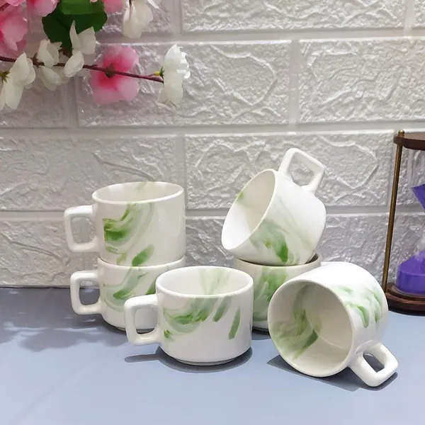 Ceramic_Tea_Cup_I_Ve_Removed_Color_Details_White_Green_Line_Size_Capacity_150_Ml_Brand_Name_Aav_World_Marketing_Descriptors_Hotel_Cup_Redundant_Information_Left_With_Just_The_Core_Product_Type_And_Material