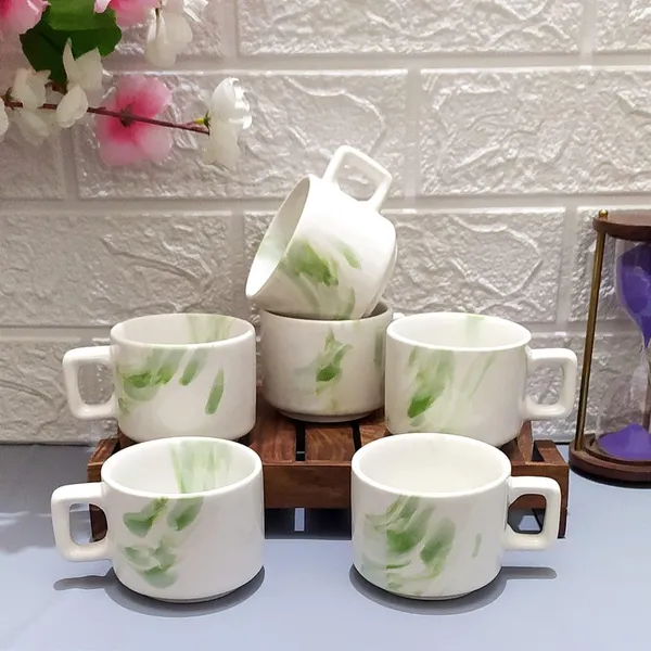 Ceramic_Tea_Cup_I_Ve_Removed_Color_Details_White_Green_Line_Size_Capacity_150_Ml_Brand_Name_Aav_World_Marketing_Descriptors_Hotel_Cup_Redundant_Information_Left_With_Just_The_Core_Product_Type_And_Material