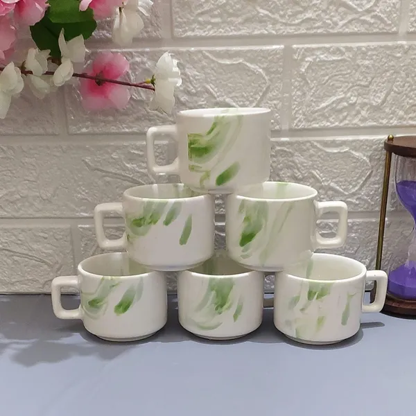 Ceramic_Tea_Cup_I_Ve_Removed_Color_Details_White_Green_Line_Size_Capacity_150_Ml_Brand_Name_Aav_World_Marketing_Descriptors_Hotel_Cup_Redundant_Information_Left_With_Just_The_Core_Product_Type_And_Material