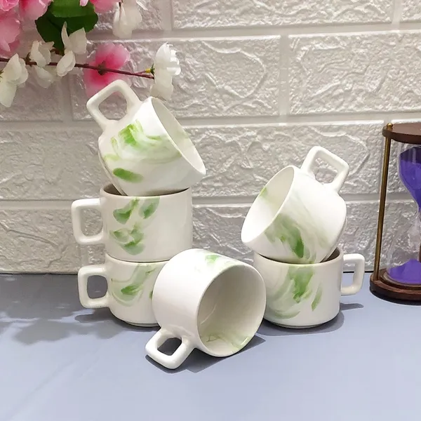 Ceramic_Tea_Cup_I_Ve_Removed_Color_Details_White_Green_Line_Size_Capacity_150_Ml_Brand_Name_Aav_World_Marketing_Descriptors_Hotel_Cup_Redundant_Information_Left_With_Just_The_Core_Product_Type_And_Material