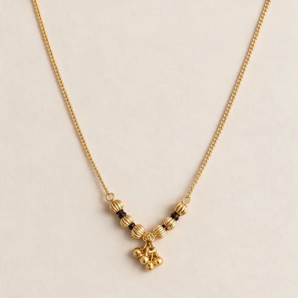 Classic_Golden_Ribbed_Bead_Floral_Drop_Mangalsutra_Pack_Of_3