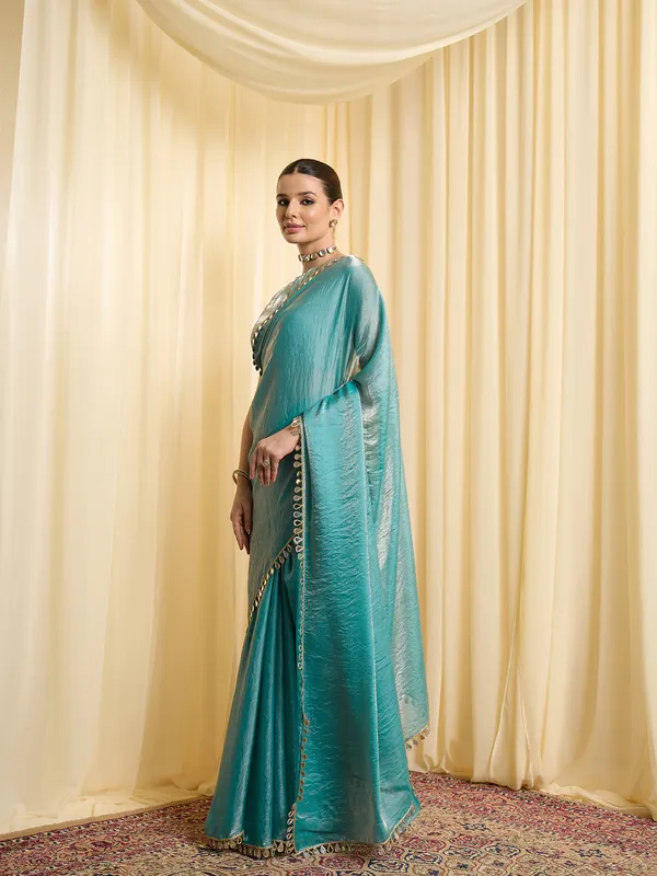 Teal_Satin_Woven_Embellished_Border_Saree_For_Women