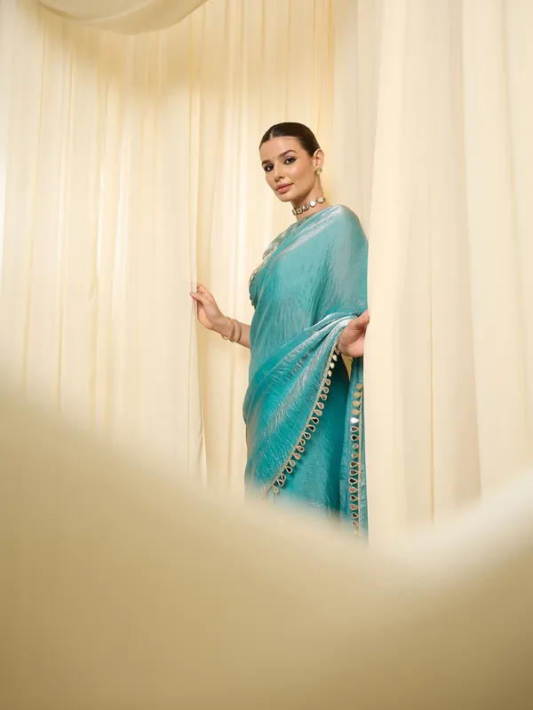 Teal_Satin_Woven_Embellished_Border_Saree_For_Women