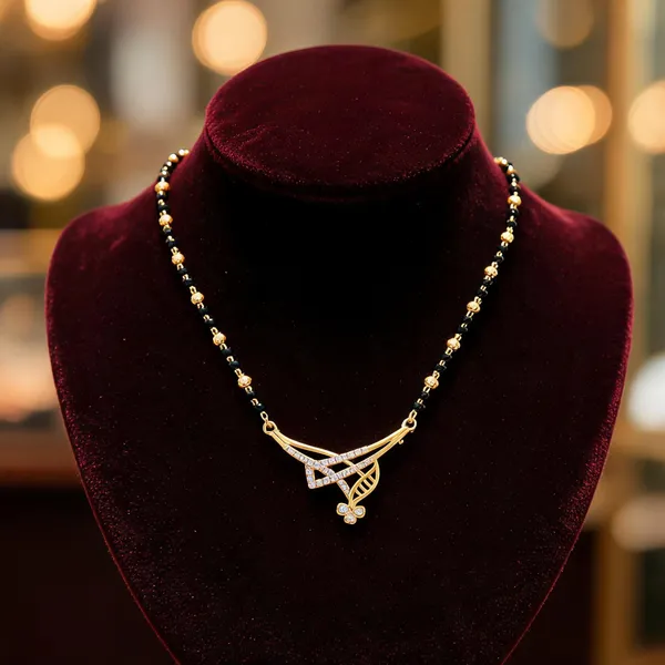 Gold_Alloy_Beaded_Crisscross_Pendant_Mangalsutra_Necklace_For_Women