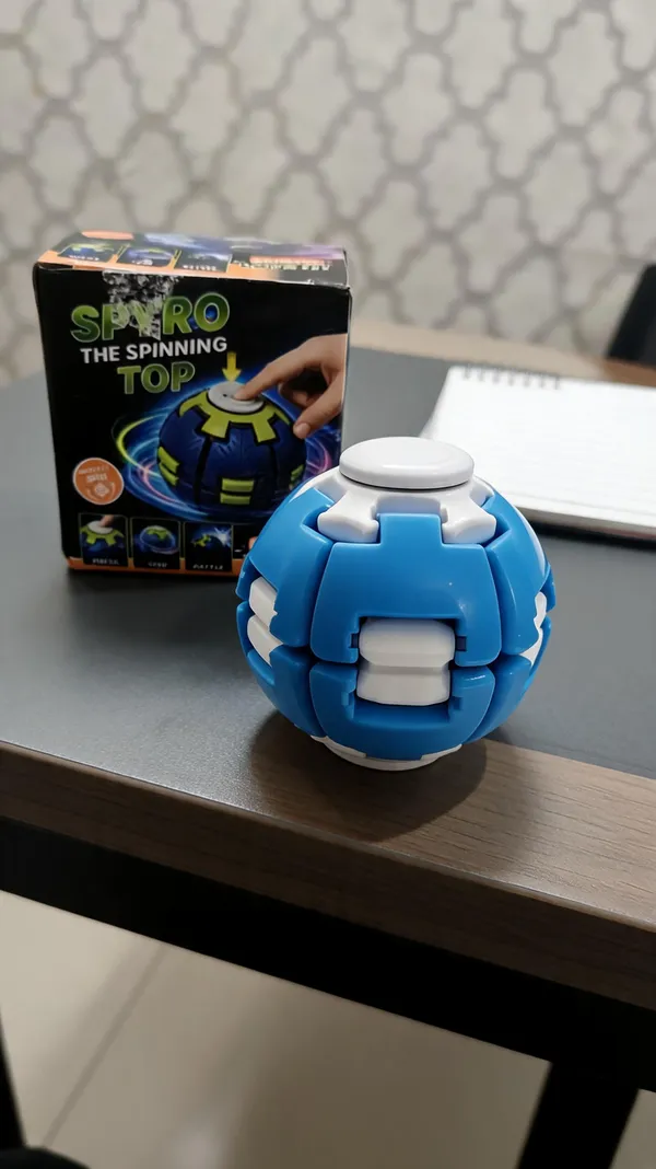 Blue_Spherical_Push_Spin_Spinning_Top_Toy_For_Kids
