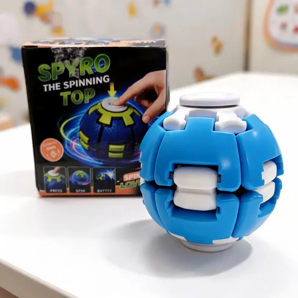 Blue_Spherical_Push_Spin_Spinning_Top_Toy_For_Kids