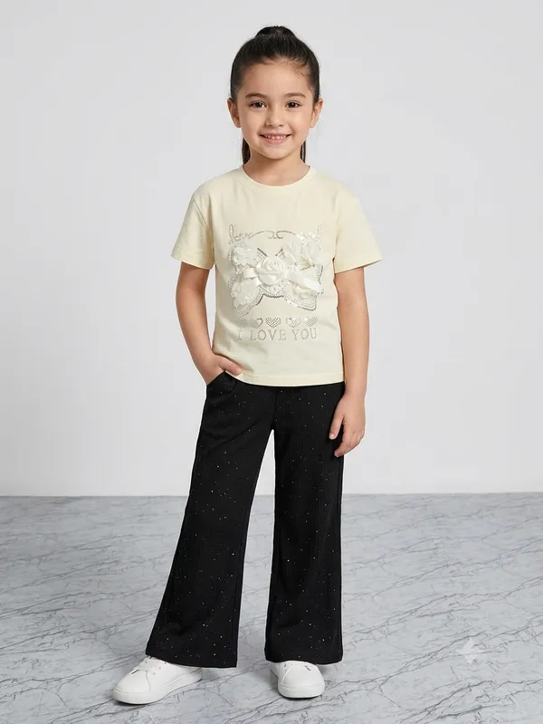 Cream_Printed_T-Shirt_And_Black_Wide_Leg_Pants_Set_for_Girls