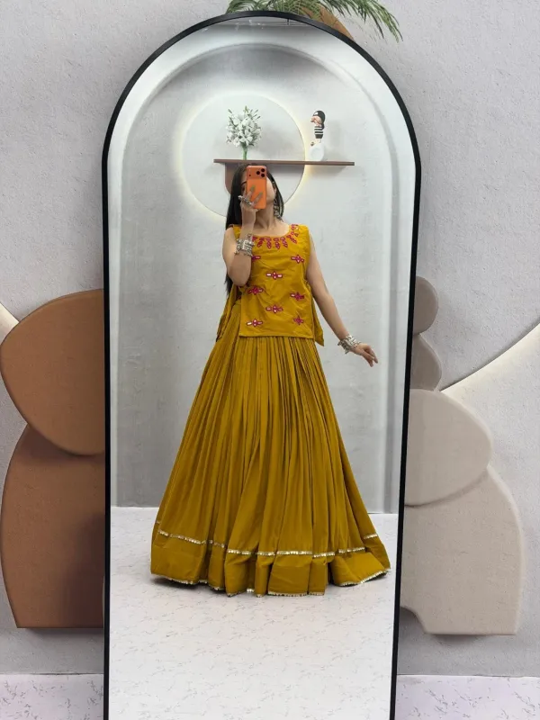 Navratri_Special_Mustard_Yellow_Flared_Pleated_Lehenga_Choli_Set_With_Pink_Mirror_Work_Embroidered_Jacket_Veronica_Fashion_Hub