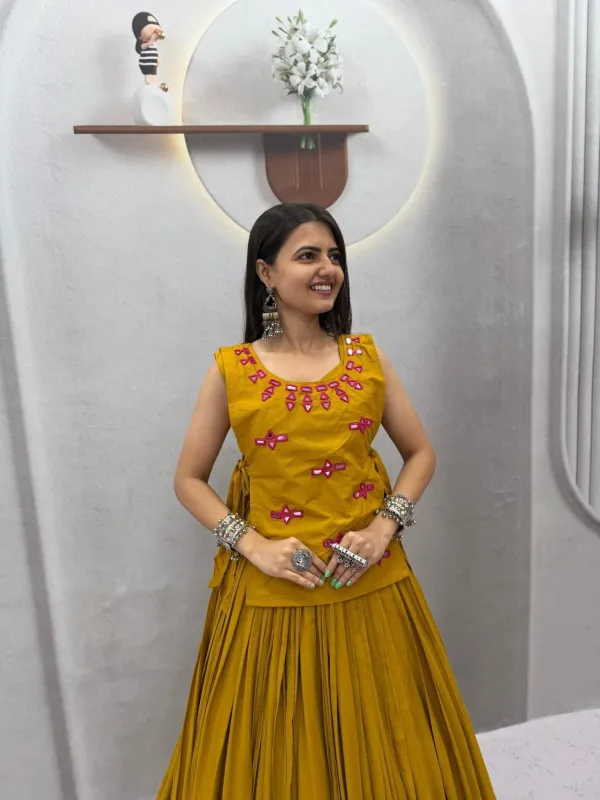 Navratri_Special_Mustard_Yellow_Flared_Pleated_Lehenga_Choli_Set_With_Pink_Mirror_Work_Embroidered_Jacket_Veronica_Fashion_Hub