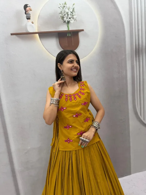 Navratri_Special_Mustard_Yellow_Flared_Pleated_Lehenga_Choli_Set_With_Pink_Mirror_Work_Embroidered_Jacket_Veronica_Fashion_Hub