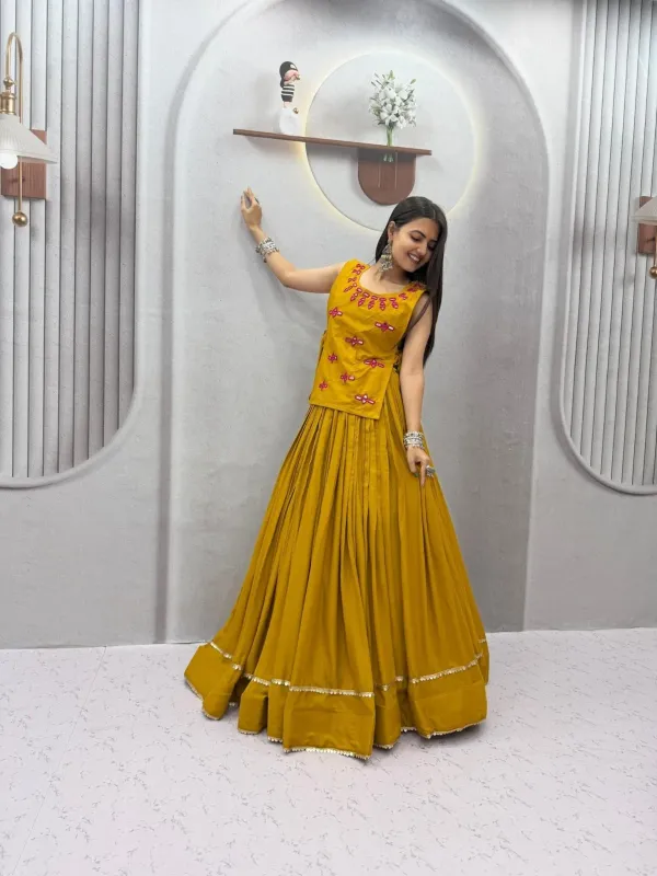 Navratri_Special_Mustard_Yellow_Flared_Pleated_Lehenga_Choli_Set_With_Pink_Mirror_Work_Embroidered_Jacket_Veronica_Fashion_Hub