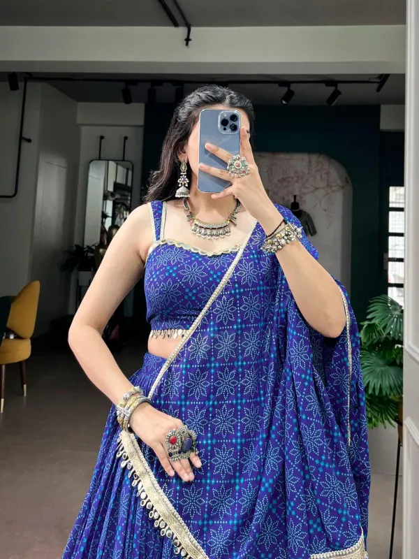 Navratri_Twirl_Into_Festive_Elegance_With_A_Beautiful_Royal_Blue_Georgette_Lehenga_Featuring_A_Traditional_Bandhej_Foil_Print_Beautifully_Finished_With_Mirror_Lace_Detailing