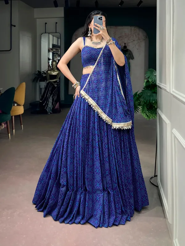 Navratri_Twirl_Into_Festive_Elegance_With_A_Beautiful_Royal_Blue_Georgette_Lehenga_Featuring_A_Traditional_Bandhej_Foil_Print_Beautifully_Finished_With_Mirror_Lace_Detailing