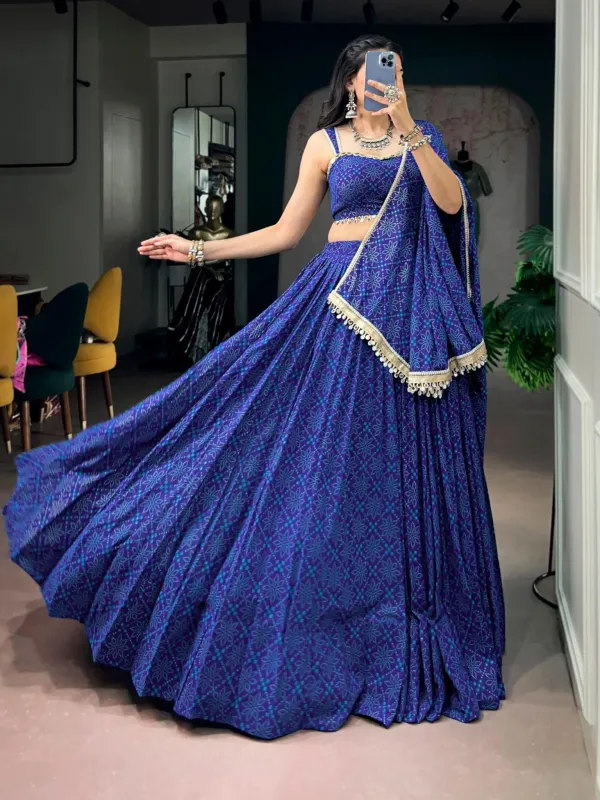 Navratri_Twirl_Into_Festive_Elegance_With_A_Beautiful_Royal_Blue_Georgette_Lehenga_Featuring_A_Traditional_Bandhej_Foil_Print_Beautifully_Finished_With_Mirror_Lace_Detailing