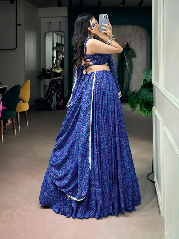 Navratri_Twirl_Into_Festive_Elegance_With_A_Beautiful_Royal_Blue_Georgette_Lehenga_Featuring_A_Traditional_Bandhej_Foil_Print_Beautifully_Finished_With_Mirror_Lace_Detailing