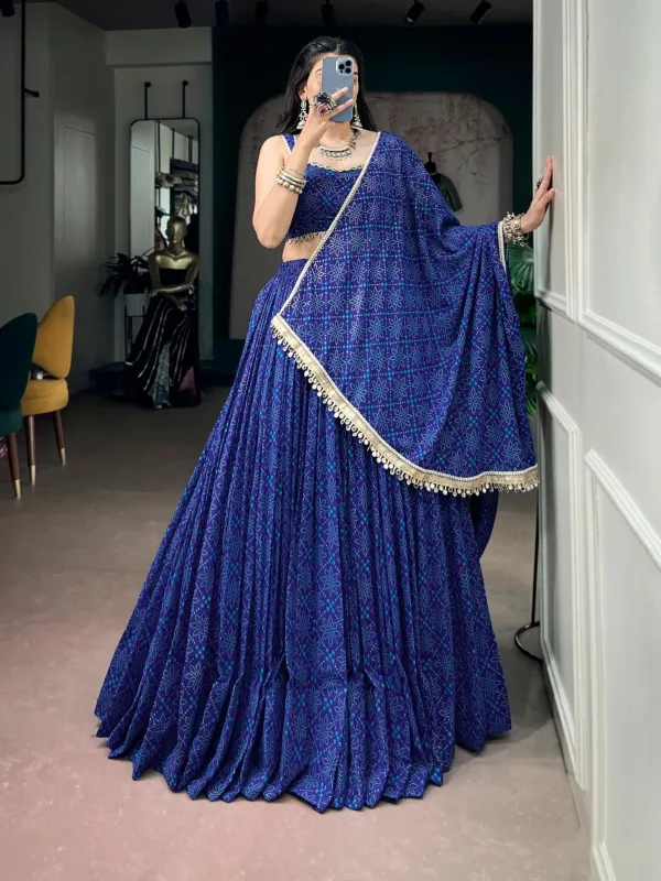 Navratri_Twirl_Into_Festive_Elegance_With_A_Beautiful_Royal_Blue_Georgette_Lehenga_Featuring_A_Traditional_Bandhej_Foil_Print_Beautifully_Finished_With_Mirror_Lace_Detailing