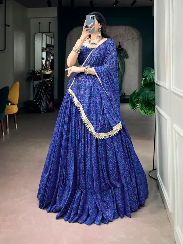 Navratri_Twirl_Into_Festive_Elegance_With_A_Beautiful_Royal_Blue_Georgette_Lehenga_Featuring_A_Traditional_Bandhej_Foil_Print_Beautifully_Finished_With_Mirror_Lace_Detailing