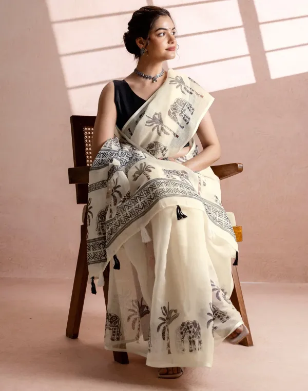 Off_White_Linen_Cotton_Elephant_Palm_Tree_Block_Printed_Saree_With_Tassels_Black_Blouse_Veronica_Fashin_Hub