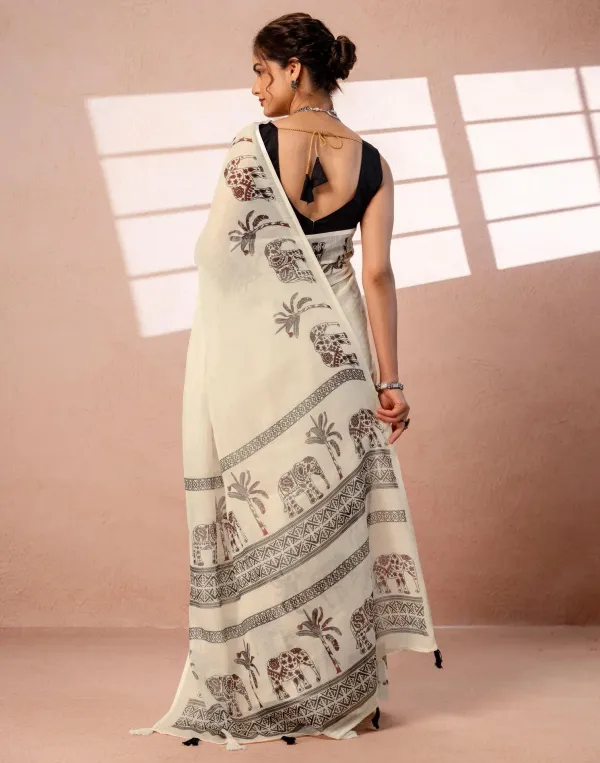 Off_White_Linen_Cotton_Elephant_Palm_Tree_Block_Printed_Saree_With_Tassels_Black_Blouse_Veronica_Fashin_Hub