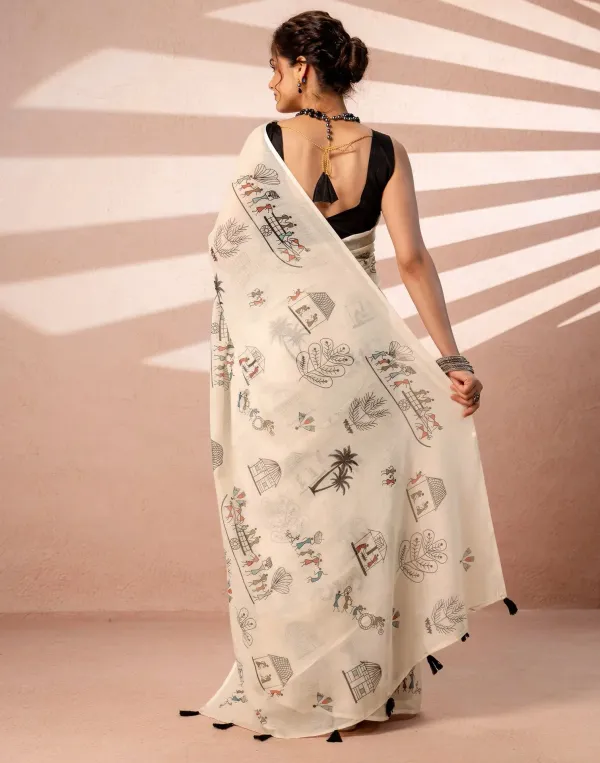 Off_White_Linen_Saree_Features_A_Unique_Black_Warli_Tribal_Art_Print_Depicting_Village_Scenes