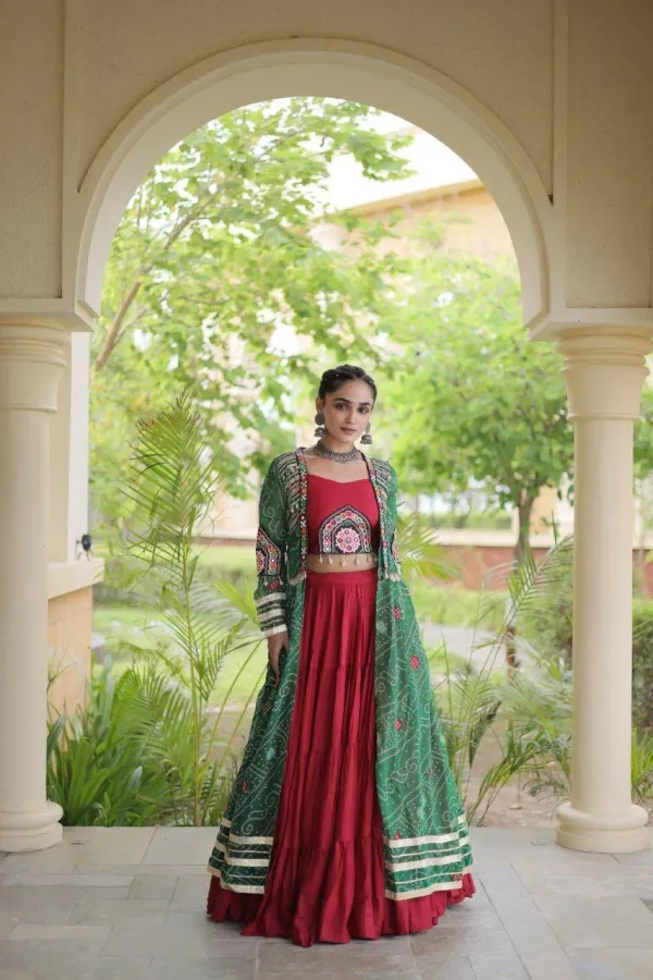 Navratri_Collections_Maroon_Flared_Tiered_Lehenga_Choli_Set_With_Green_Bandhani_Print_Shrug_Embroidered_Top_Veronica_Fashion_Hub