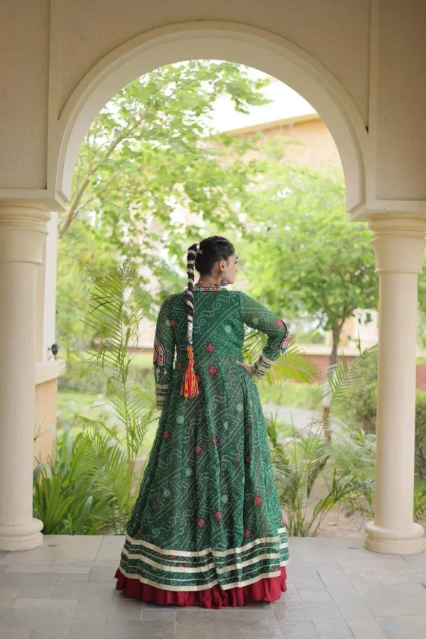 Navratri_Collections_Maroon_Flared_Tiered_Lehenga_Choli_Set_With_Green_Bandhani_Print_Shrug_Embroidered_Top_Veronica_Fashion_Hub