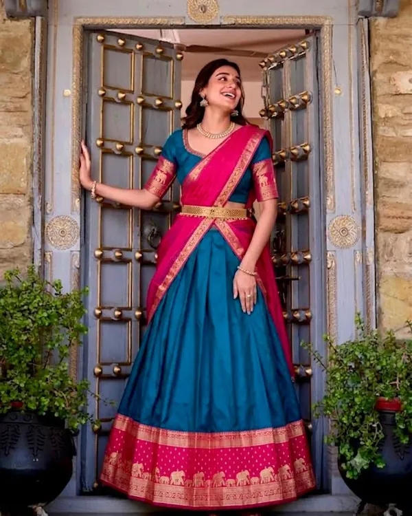 Narayan_Pattu_Lehenga_Is_A_Traditional_South_Indian_Teal_Blue_Rani_Pink_Silk_Blend_Zari_Weaving_Elephant_Border_Half_Saree_Langa_Voni_Set_Veronica_Fashion_Hub