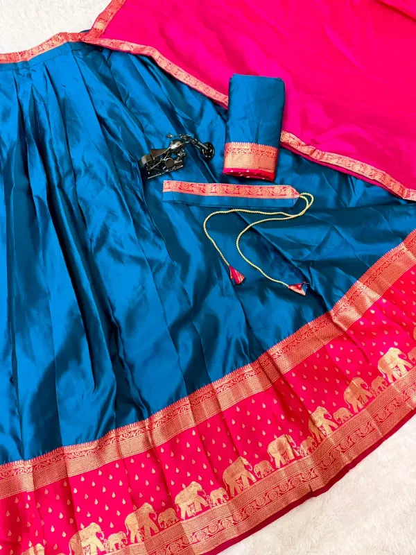 Narayan_Pattu_Lehenga_Is_A_Traditional_South_Indian_Teal_Blue_Rani_Pink_Silk_Blend_Zari_Weaving_Elephant_Border_Half_Saree_Langa_Voni_Set_Veronica_Fashion_Hub