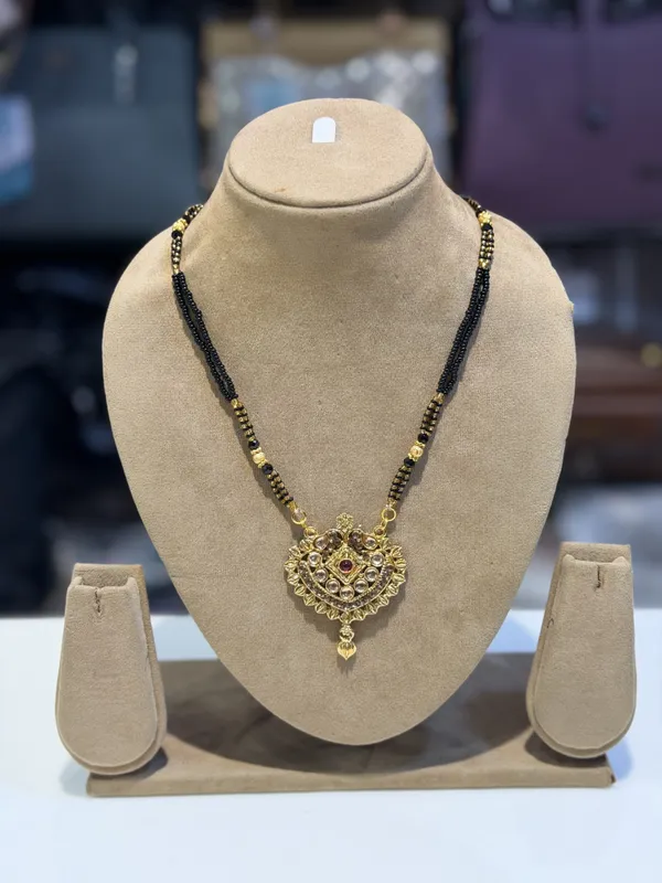 Hamsi_Black_Beaded_Gold_Tone_Mangalsutra_Necklace_for_Women