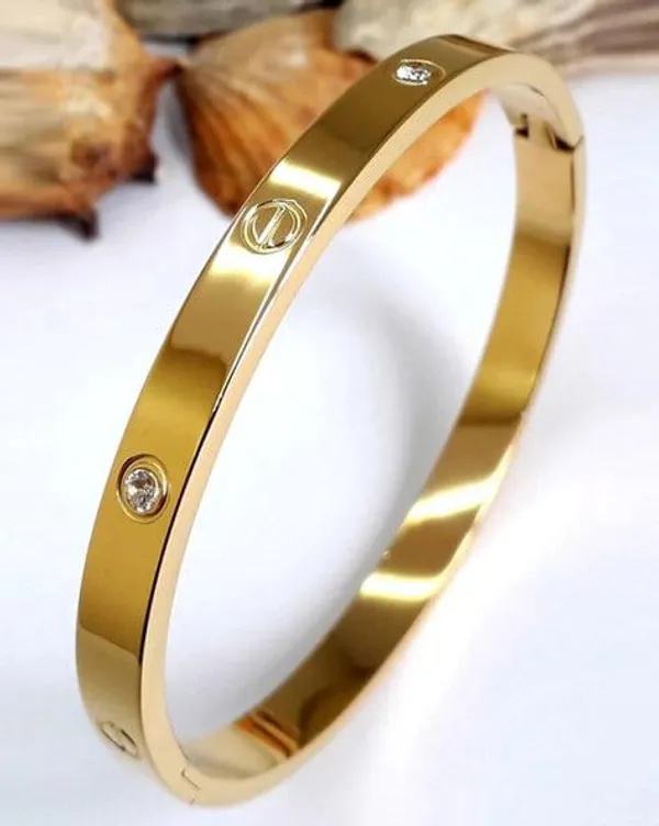 Meera_Gold_Tone_Metal_Screw_Motif_Bracelet_for_Women