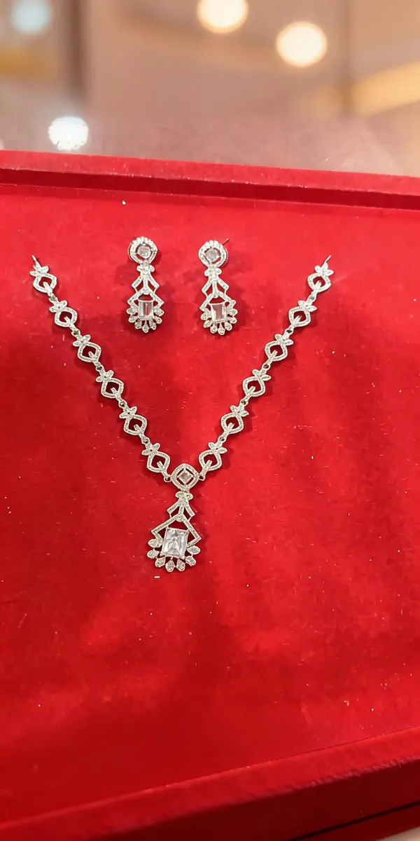 Silver_Brass_Floral_Loop_Necklace_And_Earrings_Set_For_Women