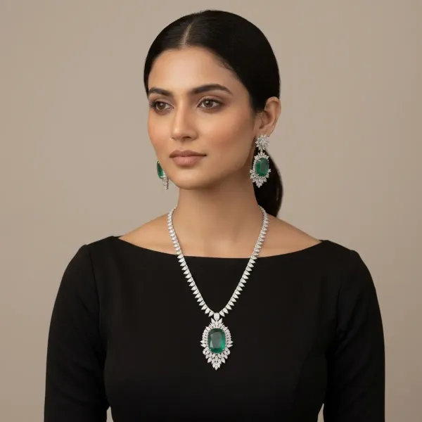 Silver_And_Emerald_Green_Stone_Studded_Necklace_And_Earrings_Set_For_Women