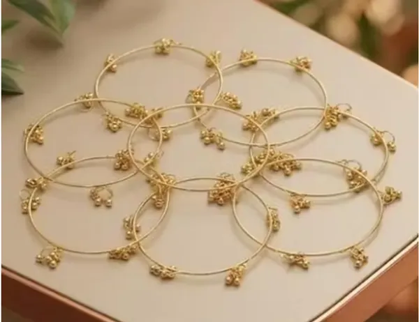 Gold_Plastic_Metal_Embellished_Bridal_Chooda_Bangle_Set_For_Women