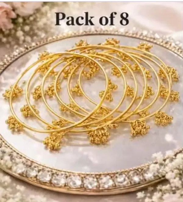 Gold_Plastic_Metal_Embellished_Bridal_Chooda_Bangle_Set_For_Women