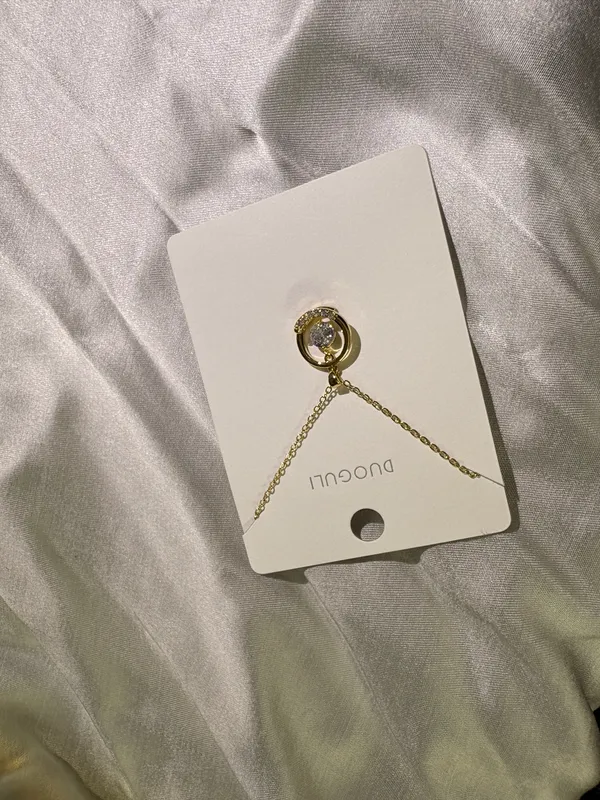 Gold_Tone_Circular_Pendant_Necklace