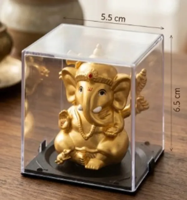 Moving_hands_Ganesh-golden_Decorative_Showpiece__-__6.5_cm_(Plastic,_Gold)