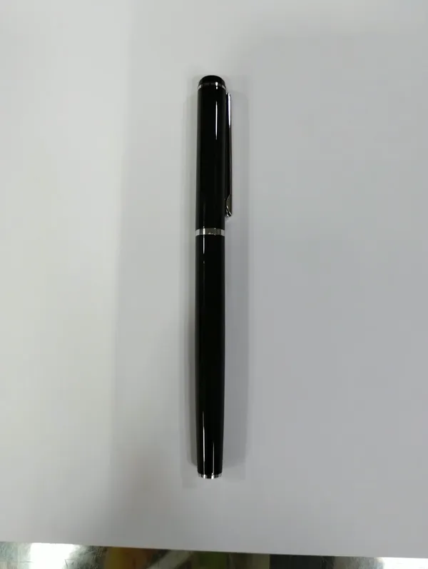 Black_Capped_Roller_Pen_With_Silver_Accents