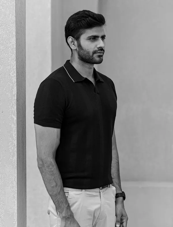 Black_Textured_Flat_Knit_Polo_T_Shirt