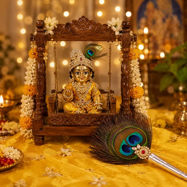 Peacock_Feather_Pooja_Chamar_With_Silver_Handle