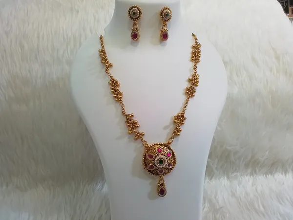 Gold_Brass_Red_Green_Stone_Studded_Pendant_Necklace_Set_For_Women