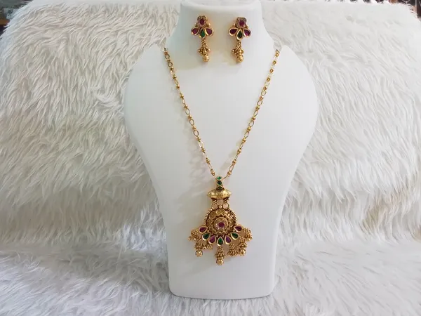 Gold_Brass_Floral_Traditional_Pendant_Necklace_And_Earrings_Set_For_Women
