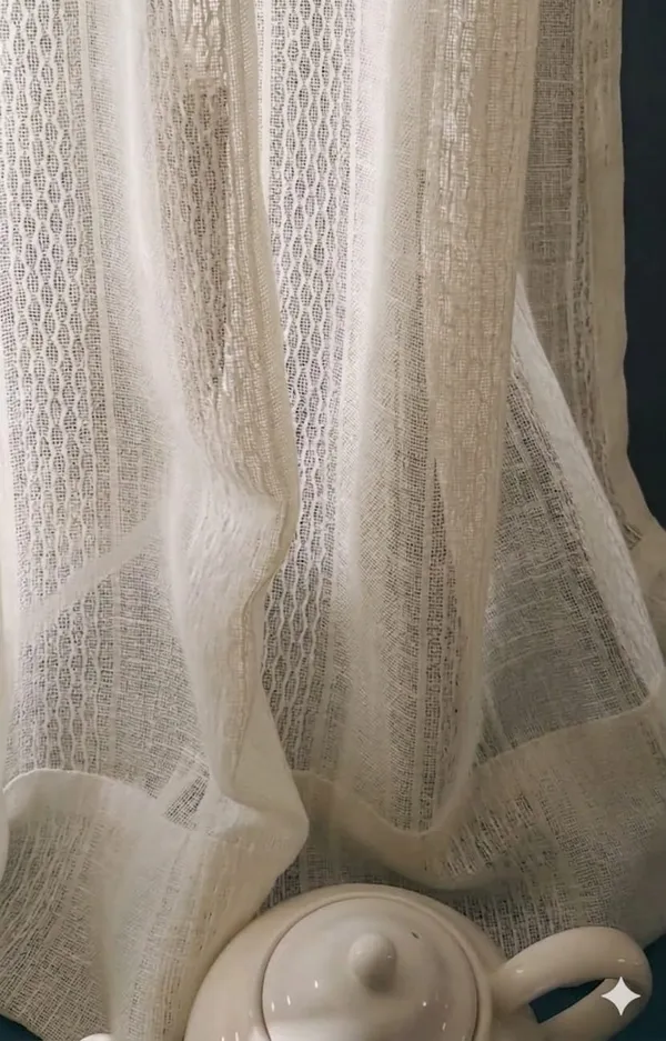 Ivory_Sheer_Textured_Grommet_Curtains