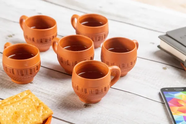 Terracotta_Tea_Cup_Internal_Thoughts_The_Input_Contains_Brand_Haus_Fabula_Material_Terracotta_Design_Detail_Dotted_Design_Feature_Microwave_Safe_Product_Type_Tea_Cup_Size_120_Ml_Quantity_Set_Of_6_Following_The_Rules_Remove_Brand_Haus_Fabula_Marketing_Terms_Handcrafted_Design_Details_Dotted_Design_Features_Microwave_Safe_Size_120_Ml_Quantity_Set_Of_6_Keep_Core_Product_Type_Tea_Cup_And_Material_Terracotta_Internal_Thoughts