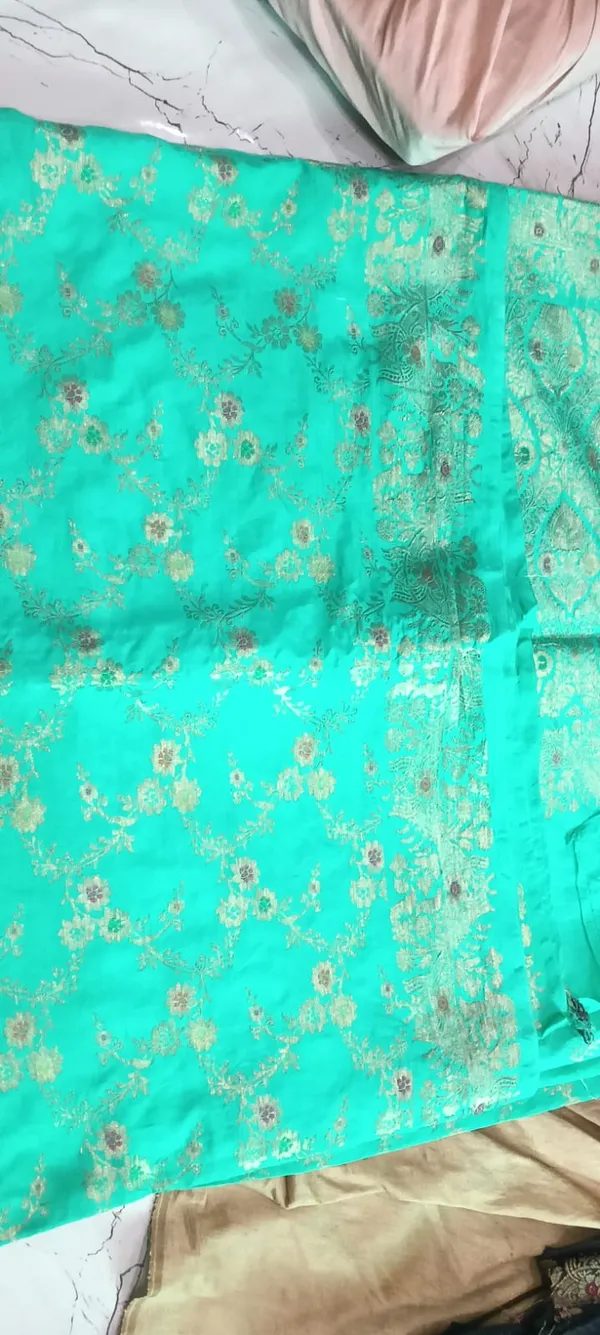 Turquoise_Floral_Woven_Saree_For_Women